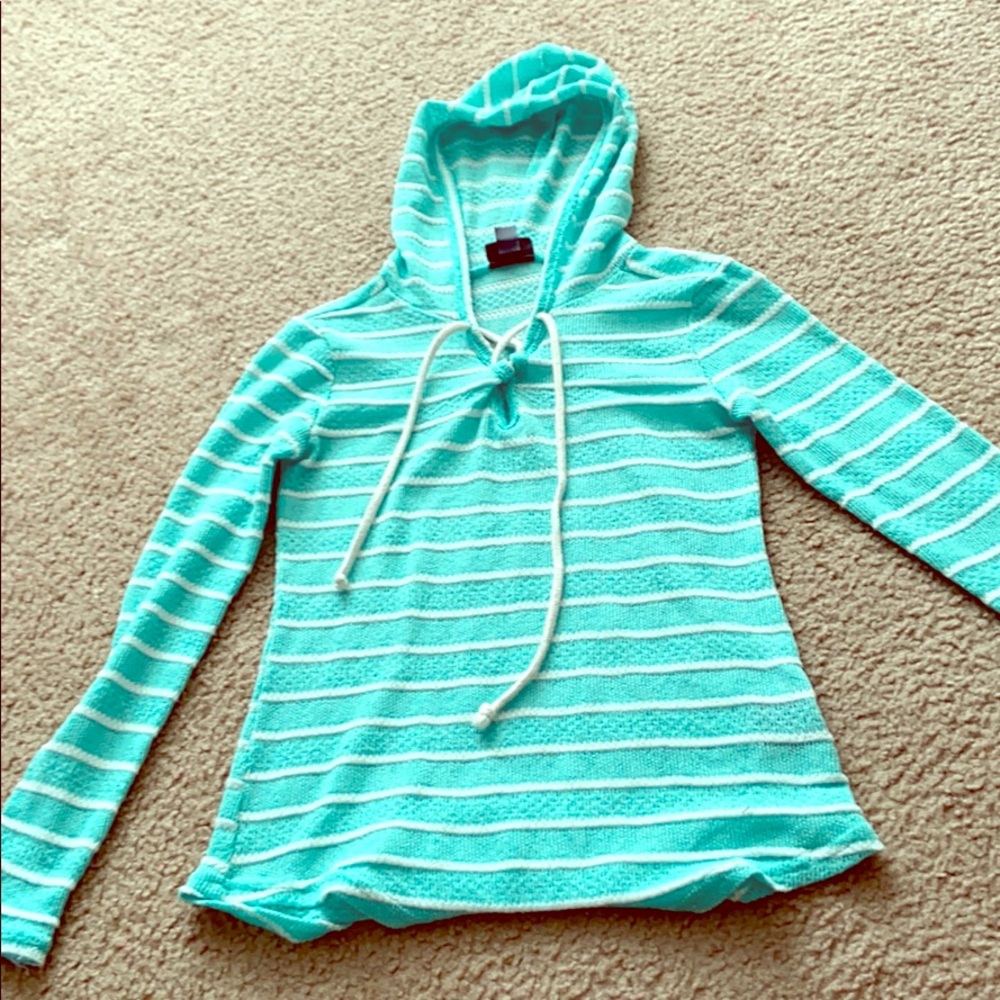 A sweater with a hood